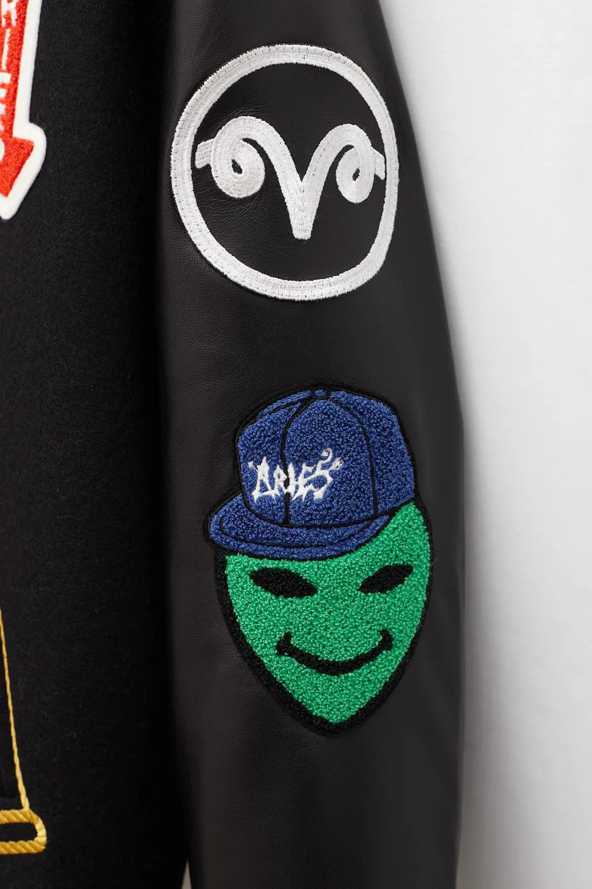 ARIES BLACK RAAW VARSITY JACKET
