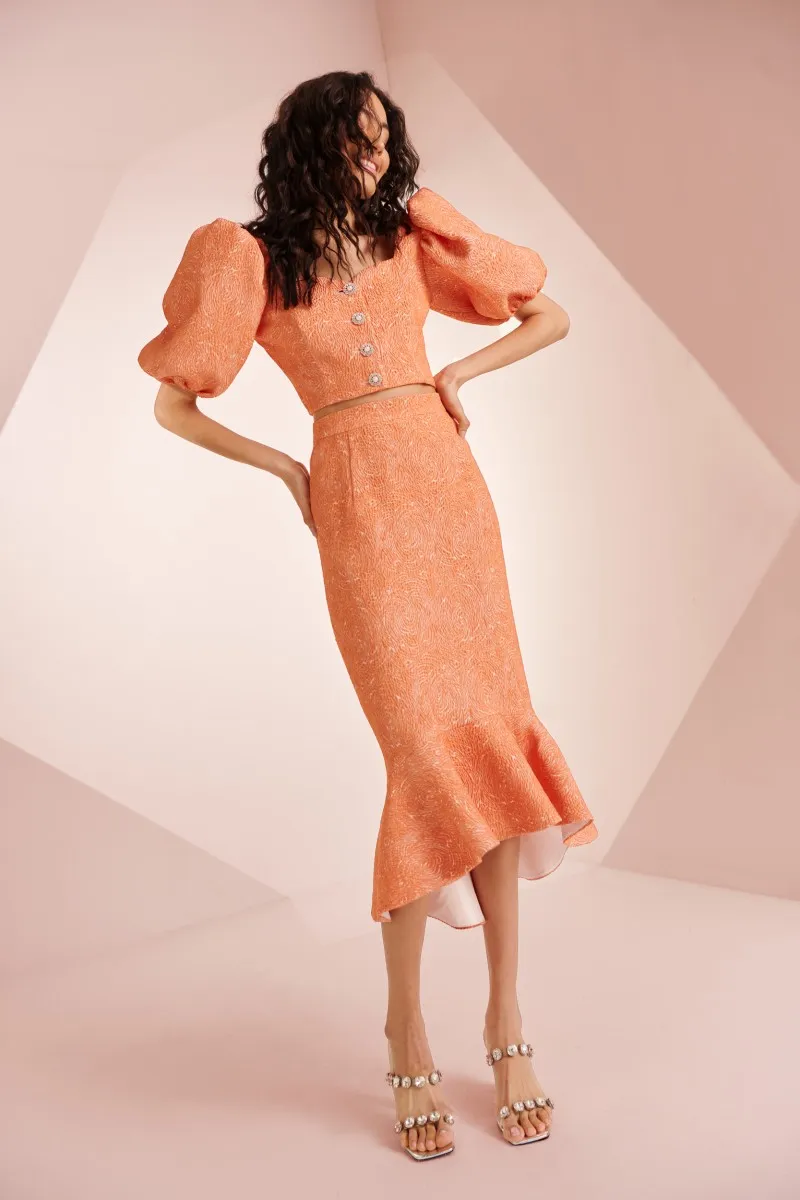 Conjunto falda y top con volante en brocado coral Mila