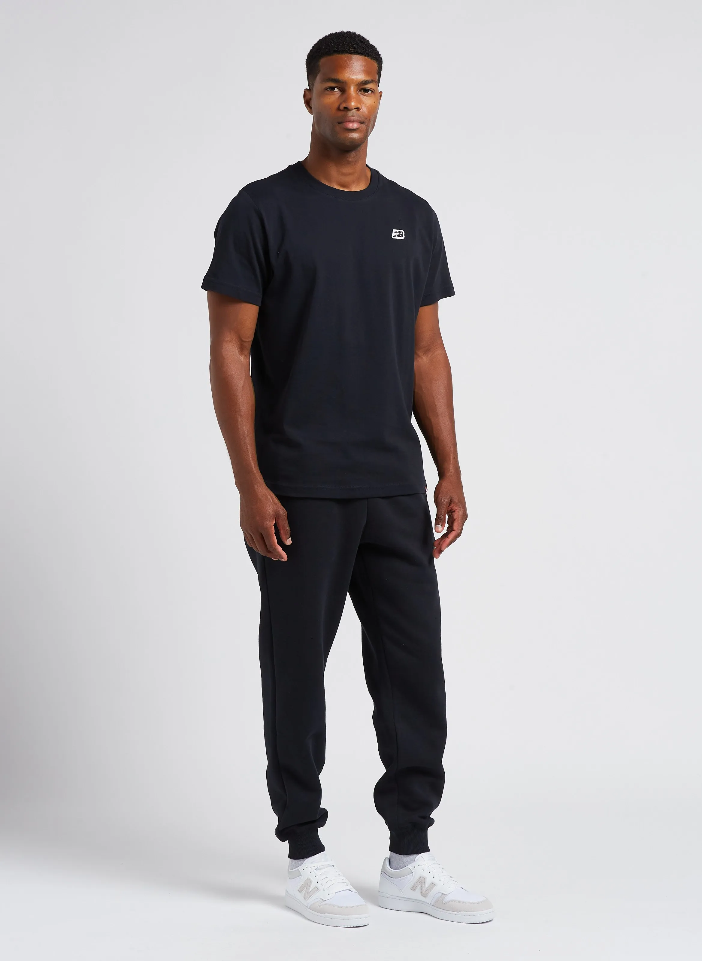 NEW BALANCE Pantalón jogger de algodón en negro